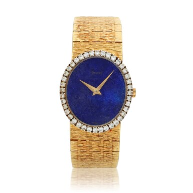 View full screen - View 1 of Lot 171. Reference 9826 A 6, A yellow gold and diamond-set bracelet watch with lapis lazuli, Circa 1975.