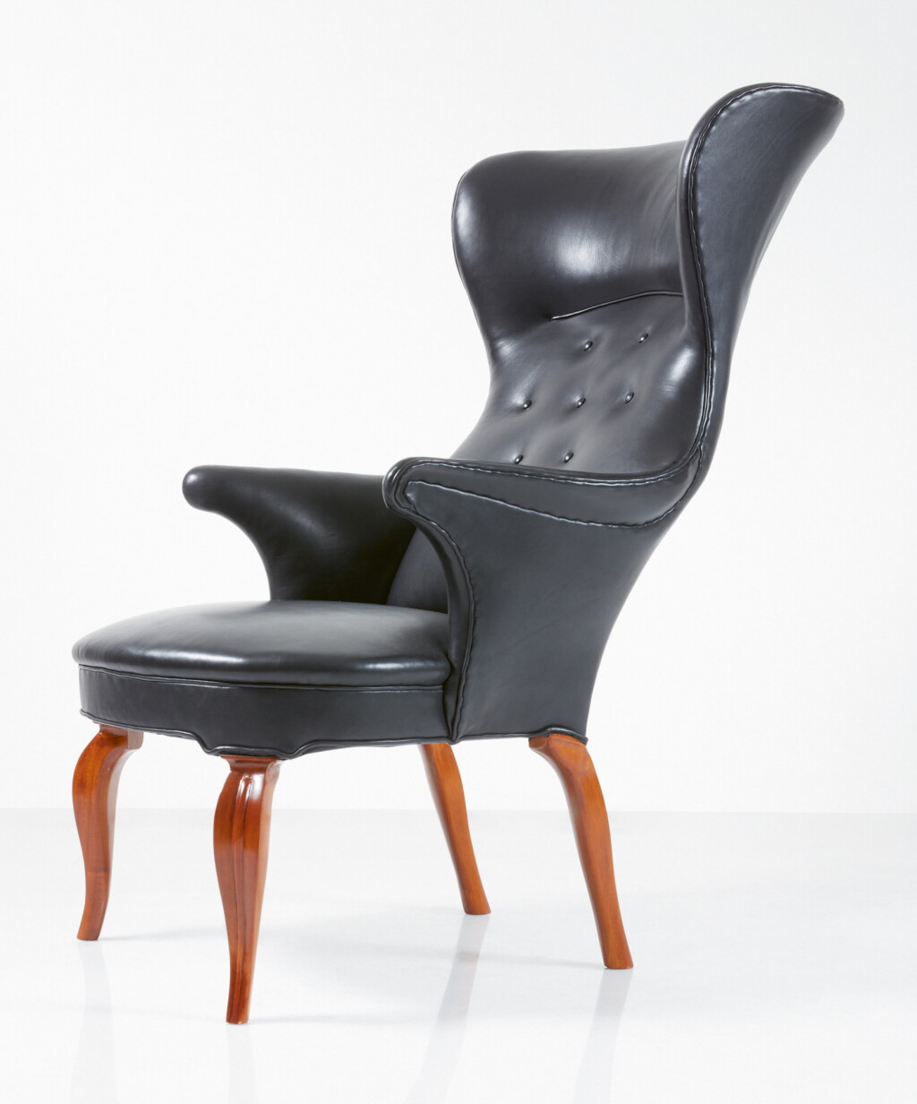 View full screen - View 1 of Lot 93. FRITS HENNINGSEN | HIGH-BACK LOUNGE ARMCHAIR.