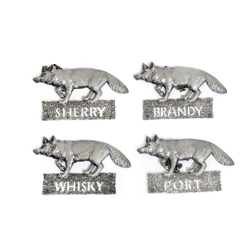 View full screen - View 1 of Lot 24. A set of four silver wine labels, Mappin & Webb Ltd., London, 1976.