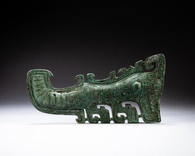 View full screen - View 1 of Lot 9. An archaic bronze ornament, Shang dynasty | 商 青銅夔紋飾.