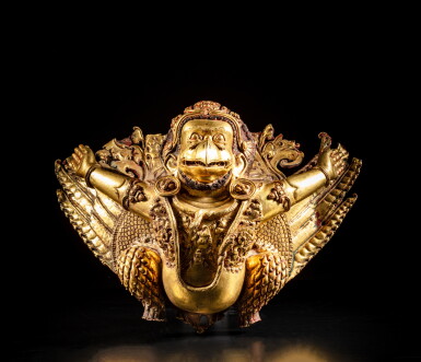 View full screen - View 1 of Lot 39. A gilt-copper repoussé figure of Garuda, Tibet, circa 15th century | 約十五世紀 藏傳鎏金銅捶揲迦樓羅坐像.