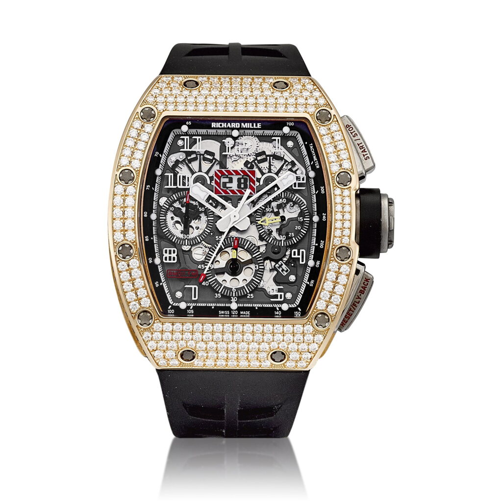 View full screen - View 1 of Lot 2320. Reference RM011 "Felipe Massa" | A pink gold, titanium, diamond and black diamond-set semi-skeletonised annual calendar flyback chronograph wristwatch with date, Circa 2013 | Richard Mille | 型號RM011 "Felipe Massa"| 粉紅金及鈦金屬鑲鑽石及黑鑽半鏤空年曆飛返計時腕錶,備日期顯示,約2013年製.