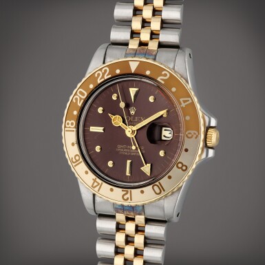 View full screen - View 1 of Lot 371. Reference 1675 GMT-Master | A yellow gold and stainless steel automatic dual time wristwatch with date and bracelet, Circa 1972.