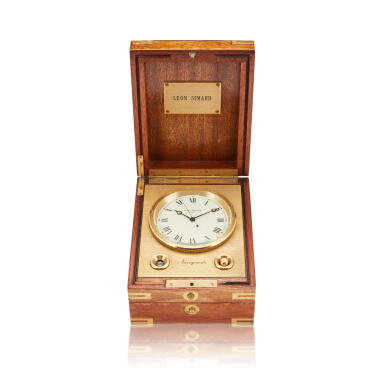 View full screen - View 1 of Lot 127. Reference 1215 Naviquartz, A gilt brass table clock with wooden box, Circa 1980.