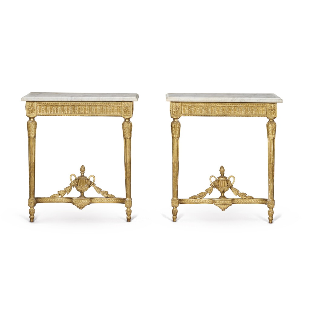 View full screen - View 1 of Lot 67. A Pair of Louis XVI Carved Giltwood Console Tables, Circa 1780.