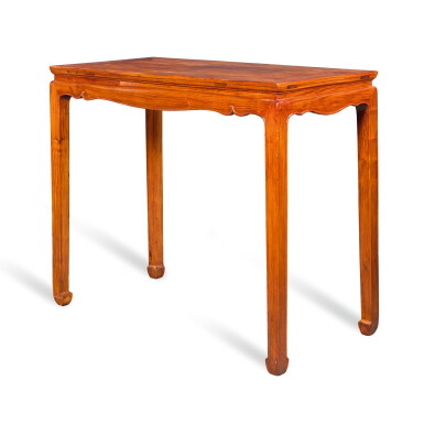 View full screen - View 1 of Lot 326. A HUANGHUALI CORNER-LEG TABLE, TIAOZHUO, 20TH CENTURY | 二十世紀 黃花梨條桌.