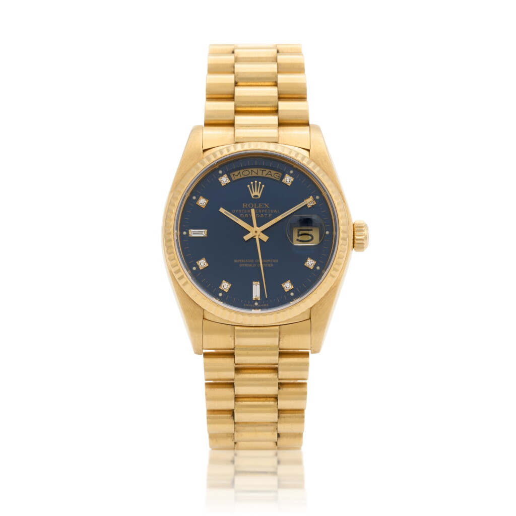 View full screen - View 1 of Lot 169. Day-Date, Ref. 18038 Yellow gold and diamond-set wristwatch with date, day and bracelet Circa 1979.