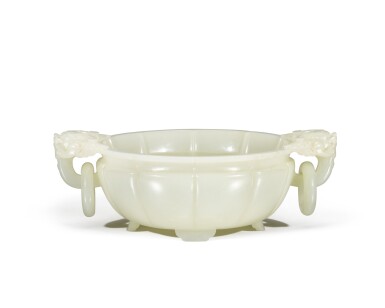 View full screen - View 1 of Lot 24. A white jade 'dragon' washer, Qing dynasty, Qianlong period | 清乾隆 白玉龍首活環洗.