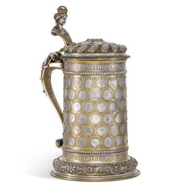 View full screen - View 1 of Lot 122. An unusually large German parcel-gilt silver coin-set tankard, possibly Freidlander Brothers of Berlin, circa 1871.