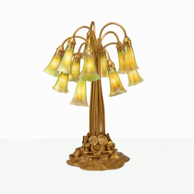 View full screen - View 1 of Lot 21. TIFFANY STUDIOS | TWELVE-LIGHT "LILY" TABLE LAMP.