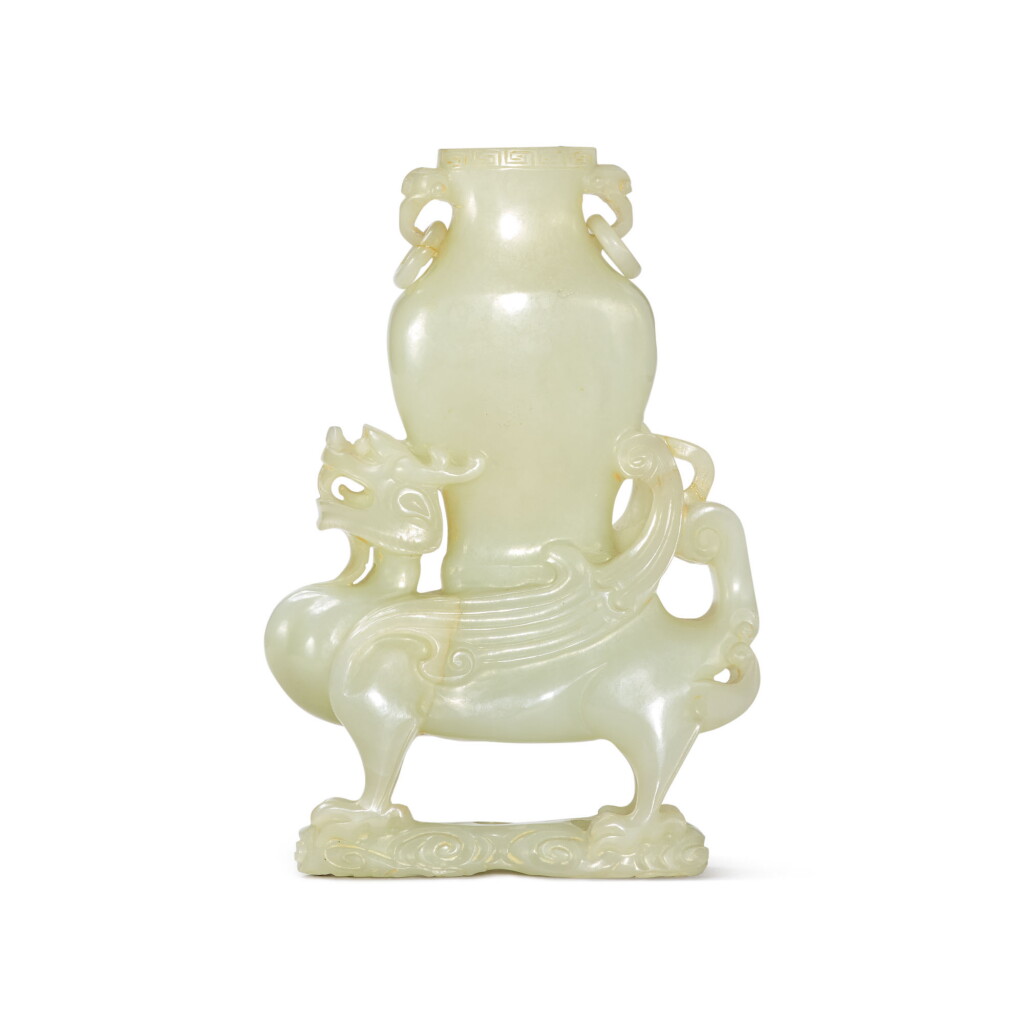 View full screen - View 1 of Lot 108. A CHINESE PALE CELADON JADE 'QILIN' VASE, QING DYNASTY, 19TH CENTURY.