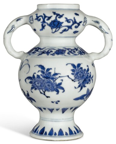 View full screen - View 1 of Lot 328. A BLUE AND WHITE ELEPHANT-HANDLED VASE TRANSITIONAL PERIOD | 明末清初 青花花卉紋象耳瓶.