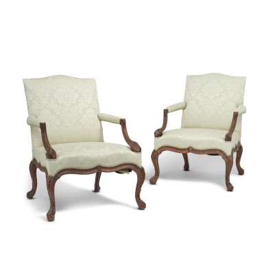 View full screen - View 1 of Lot 11. A pair of George III carved mahogany armchairs, circa 1765, attributed to John Gordon.
