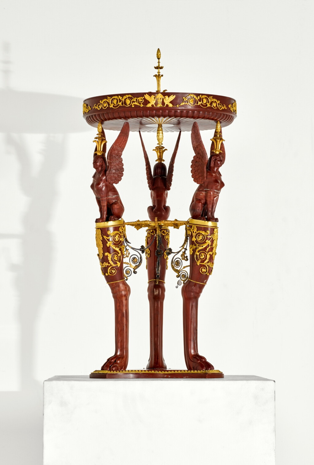 View full screen - View 1 of Lot 19. An Italian gilt-bronze mounted carved 'rosso antico' marble athenienne after the antique, circa 1810-15.