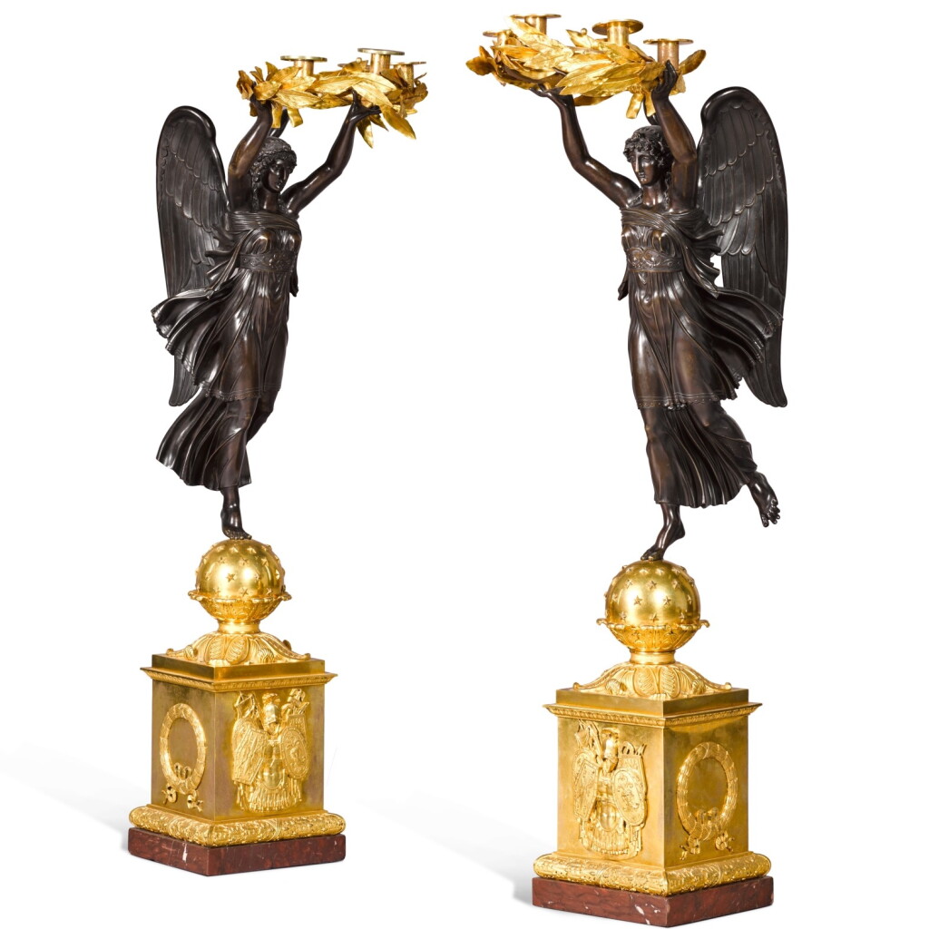 View full screen - View 1 of Lot 113. A pair of Empire gilt and patinated bronze four-light candelabra by Claude-François Rabiat, probably for Pierre-Philippe Thomire, circa 1810.