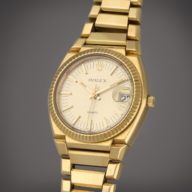 View full screen - View 1 of Lot 53. 'Texan', Reference 5100 | A yellow gold wristwatch with date and bracelet | Circa 1970.