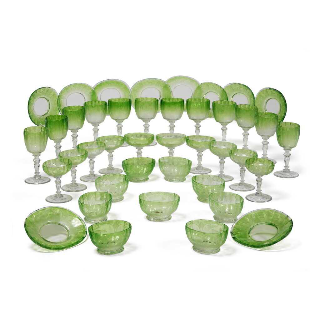 View full screen - View 1 of Lot 62. A Continental Green-Tinted and Engraved 'Hunting' Glass Table Service, Early 20th Century.