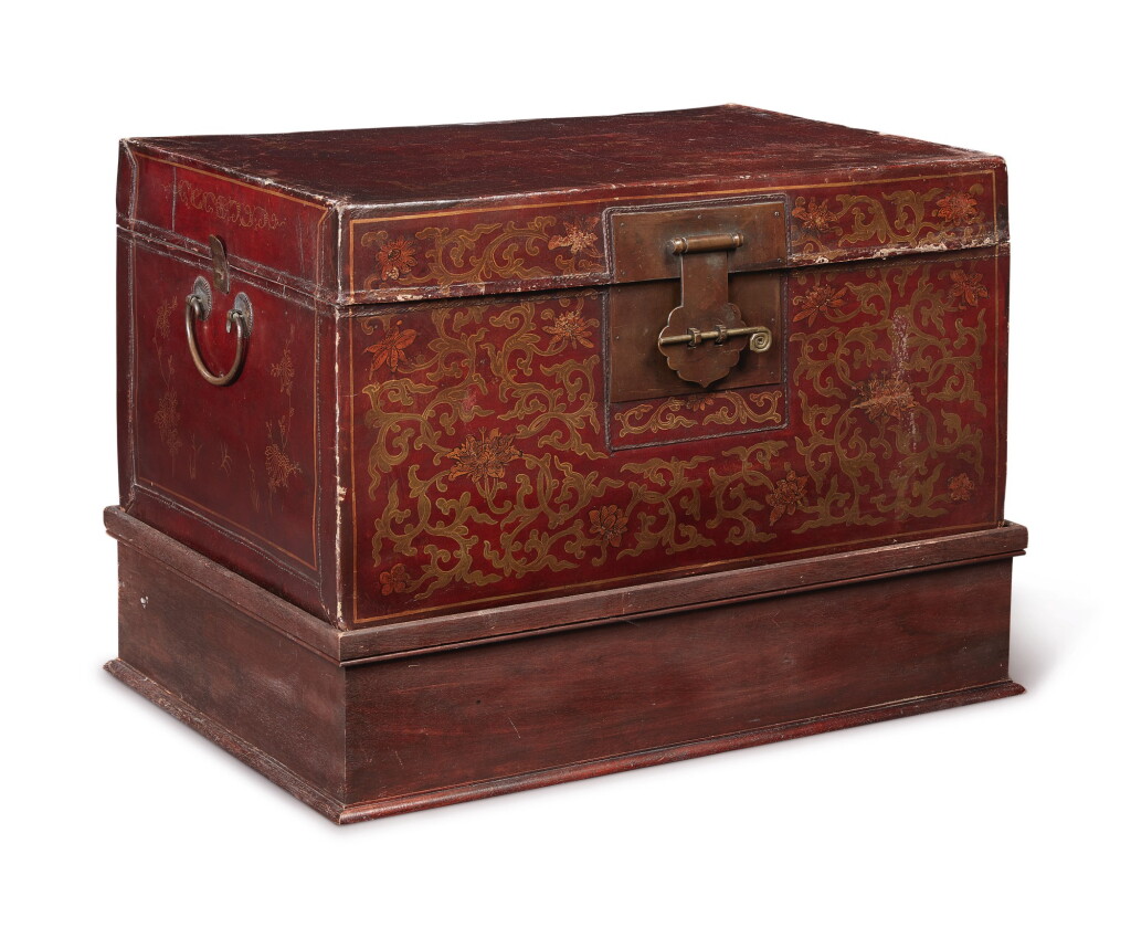 View full screen - View 1 of Lot 1044. A POLYCHROME-PAINTED LEATHER CHEST, 19TH CENTURY.