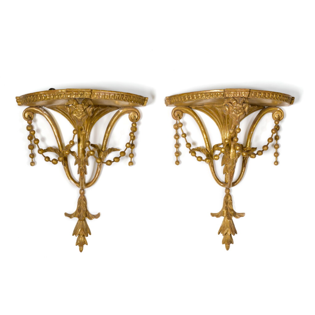View full screen - View 1 of Lot 109. A pair of George III carved giltwood wall brackets, late 18th century.