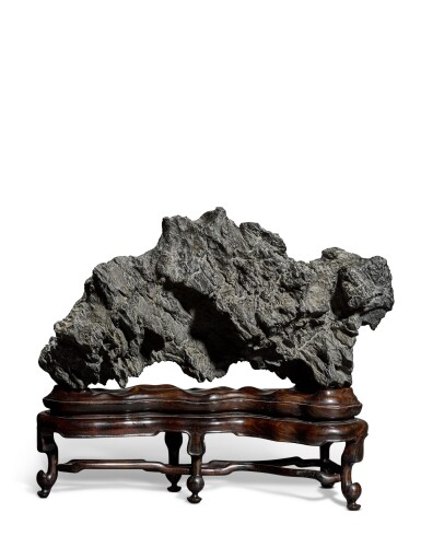 View full screen - View 1 of Lot 3. A large 'Lingbi' scholar's rock, Ming - Qing dynasty | 明至清 靈璧石供.