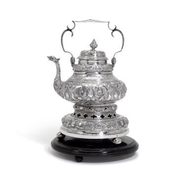 View full screen - View 1 of Lot 86. A Dutch 18th century silver teapot on later heater base, maker's mark indistinct initials crowned, Sneek, 1742.
