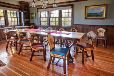 View full screen - View 1 of Lot 23. Dining Table and Set of Twelve Dining Chairs.