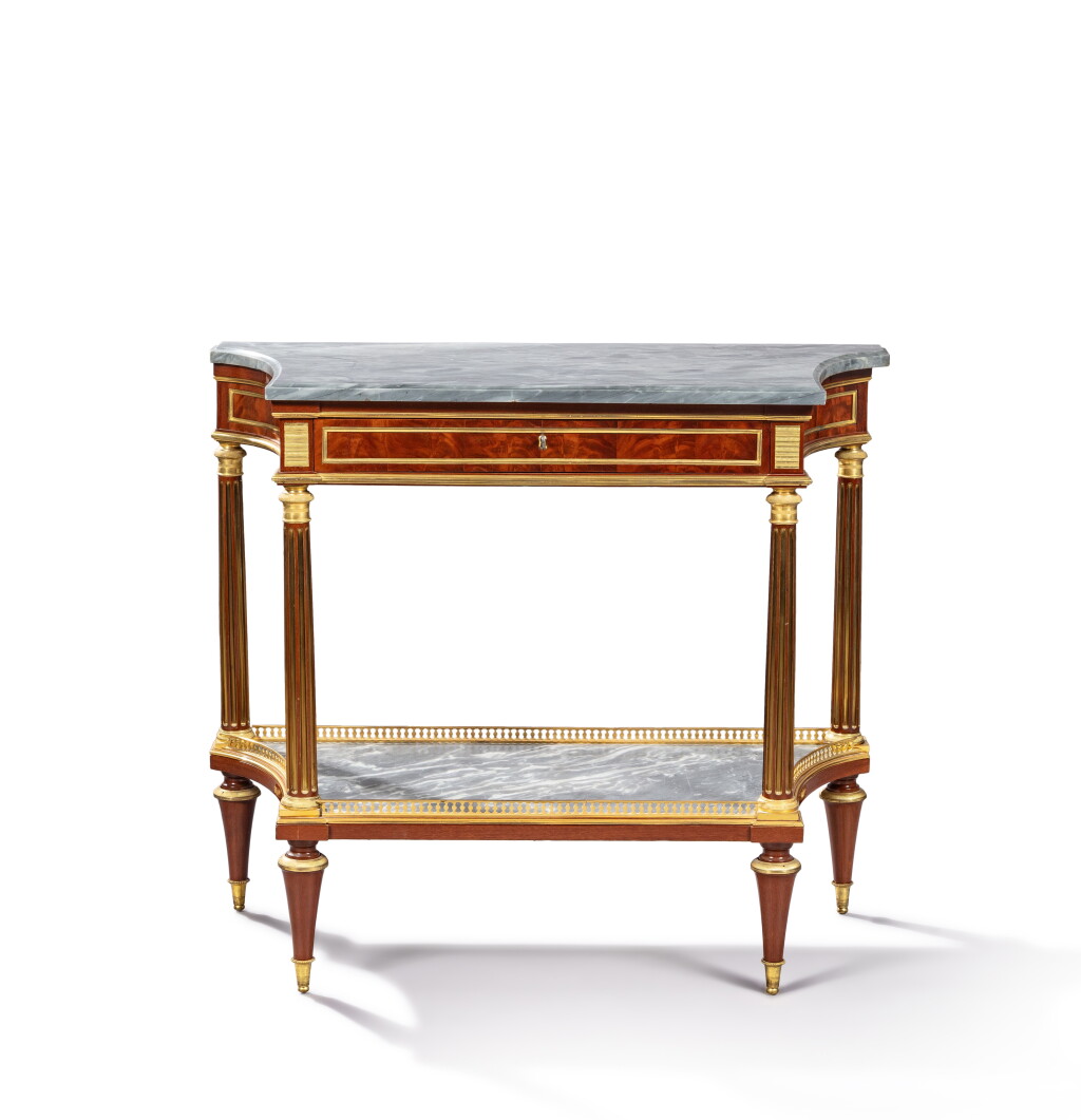 View full screen - View 1 of Lot 17. A Louis XVI regilt-bronze mounted mahogany and plum pudding mahogany veneered console, circa 1780, by Adam Weisweiler.