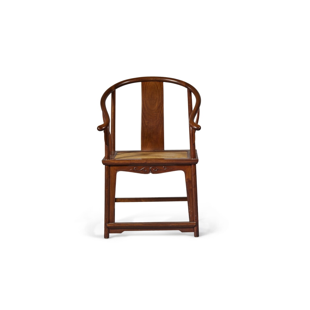 View full screen - View 1 of Lot 1350. A 'huanghuali' horseshoeback armchair (Quanyi), Qing dynasty, 18th / 19th century | 清十八 / 十九世纪 黃花梨圈椅.