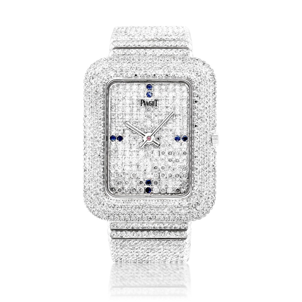 View full screen - View 1 of Lot 8087. Reference 14105 C15 | A white gold, diamond and sapphire-set bracelet watch with Beta 21 movement, Circa 1970 | 伯爵 | 型號14105 C15 | 白金鑲鑽石及藍寶石鏈帶腕錶,備 Beta 21 機芯,約1970年製.