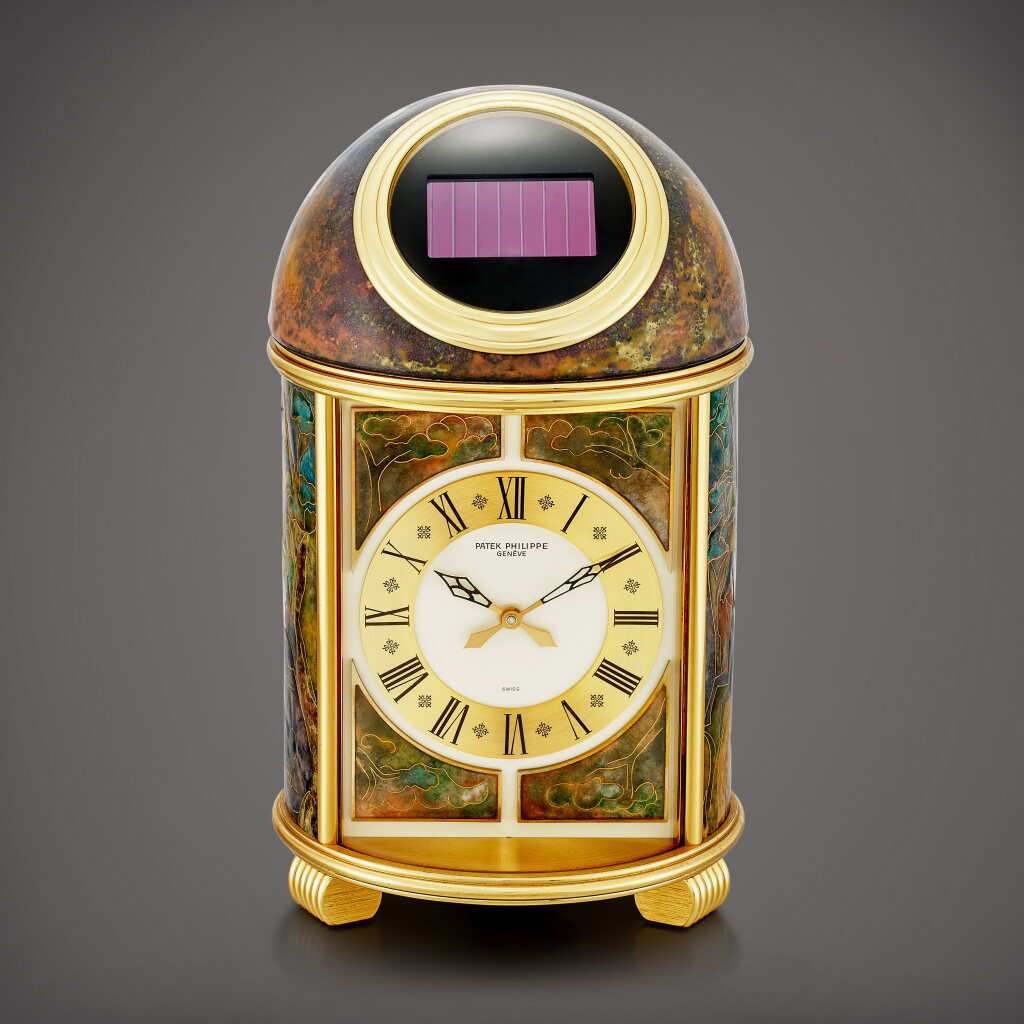 View full screen - View 1 of Lot 2269. "Une page d'Histoire", Reference 1350M | A unique gilt brass solar powered dome table clock with cloisonné enamel, Made in 1990 | 百達翡麗 | "Une page d'Histoire" 型號1350M | 獨一無二鍍金銅製太陽能座鐘,備掐絲琺瑯,1990年製.