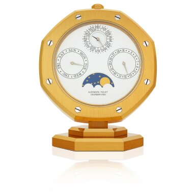 View full screen - View 1 of Lot 179. AUDEMARS PIGUET | ROYAL OAK CALENDAR, REF 2100 GILT-BRASS PERPETUAL TABLE CALENDAR WITH MOON PHASES AND LEAP-YEAR INDICATION CIRCA 1994.