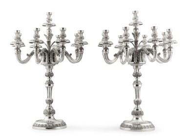 View full screen - View 1 of Lot 224. An Italian silver pair of large nine-light candelabra, Buccellati, Milan, circa 1980 | Paire de grands chandeliers à neuf lumières en argent par Buccellati, Milan, vers 1980.