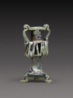 A Roman Green Glass Unguentarium, circa 4th century A.D.
