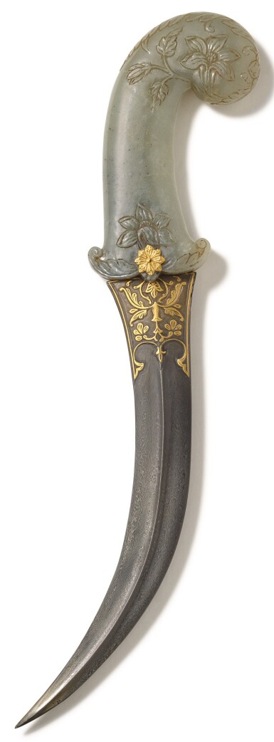 View full screen - View 1 of Lot 189. A MUGHAL CARVED JADE-HILTED DAGGER (KHANJAR) WITH WATERED-STEEL BLADE, INDIA, 18TH CENTURY.