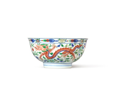 View full screen - View 1 of Lot 3631. A fine wucai 'dragon and phoenix' bowl, Mark and period of Kangxi | 清康熙 五彩龍鳳呈祥紋盌 《大清康熙年製》款.