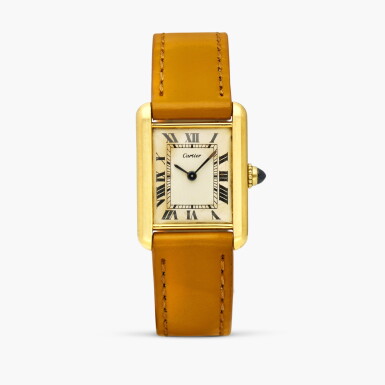 View full screen - View 1 of Lot 2497. Tank J.J.C. | A rectangular yellow gold lady’s wristwatch with original gold deployant buckle, Circa 1976-77.
