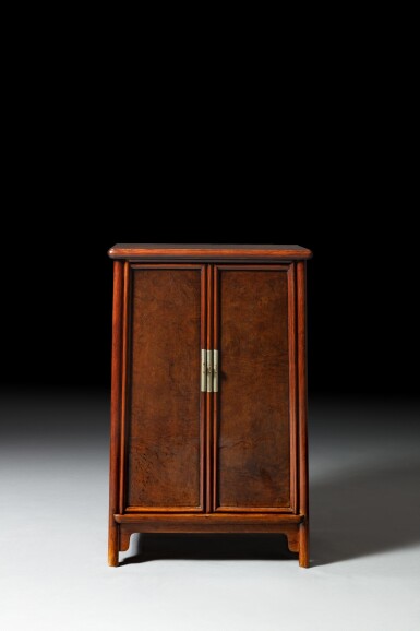 View full screen - View 1 of Lot 40. A 'huanghuali' and burlwood cabinet (Yuanjiaogui), Ming dynasty, Late 16th / Early 17th century.