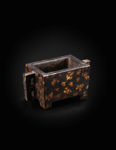 View full screen - View 1 of Lot 123. A rectangular gold-splashed bronze archaistic incense burner Qing dynasty, 18th century | 清十八世紀 灑金銅馬槽爐《宣德》仿款.