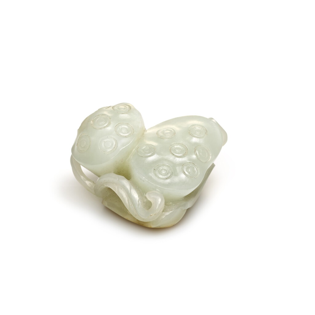 View full screen - View 1 of Lot 210. A WHITE JADE LOTUS SEED POD GROUP, QING DYNASTY, 18TH/19TH CENTURY | 清十八/十九世紀 白玉蓮蓬把件.