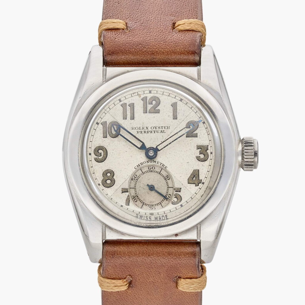 View full screen - View 1 of Lot 406. Reference 2764 'Bubbleback' | A stainless steel automatic wristwatch with bow tie dial, Circa 1939.
