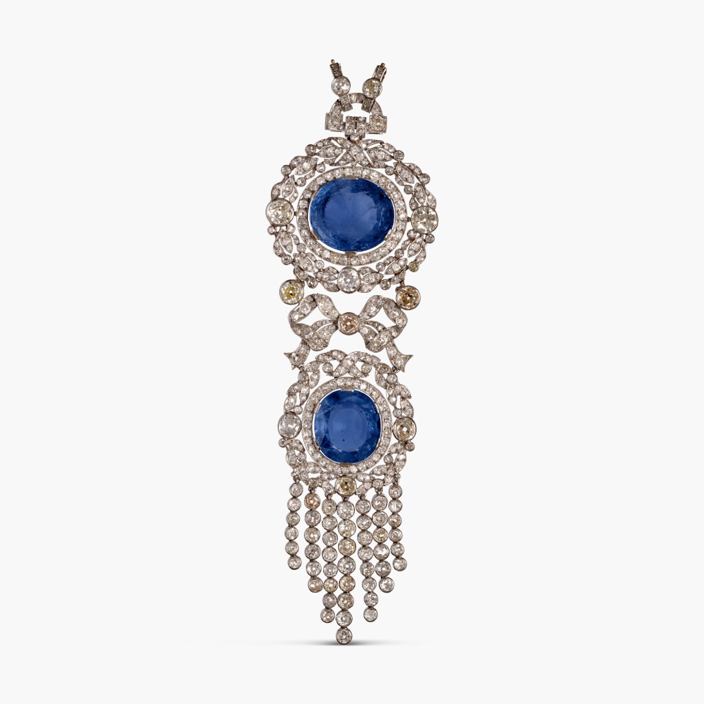 View full screen - View 1 of Lot 562. Sapphire and Diamond Pendant.