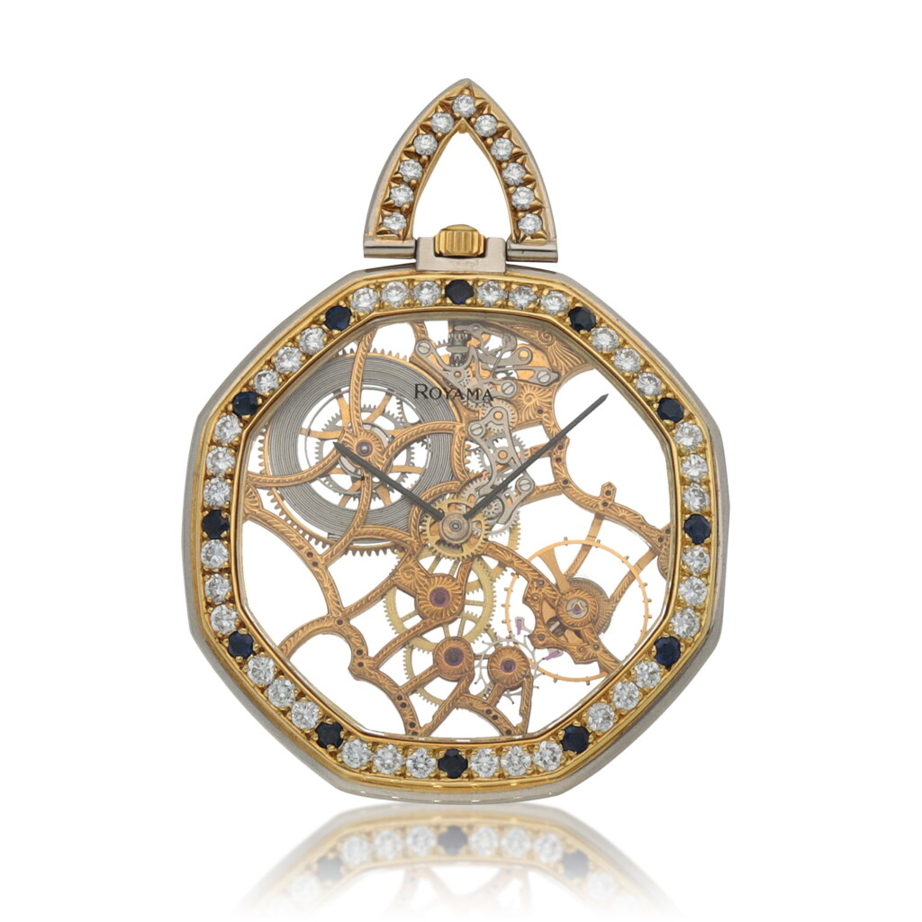 View full screen - View 1 of Lot 63. Retailed by Royama: Ref. G2144 Yellow and white gold diamond and sapphire-set skeletonized watch Circa 1980 | Gérald Genta | G2144型號黃金及白金鑲鑽石及藍寶石鏤空懷錶,零售商為Royama,年份約1980.