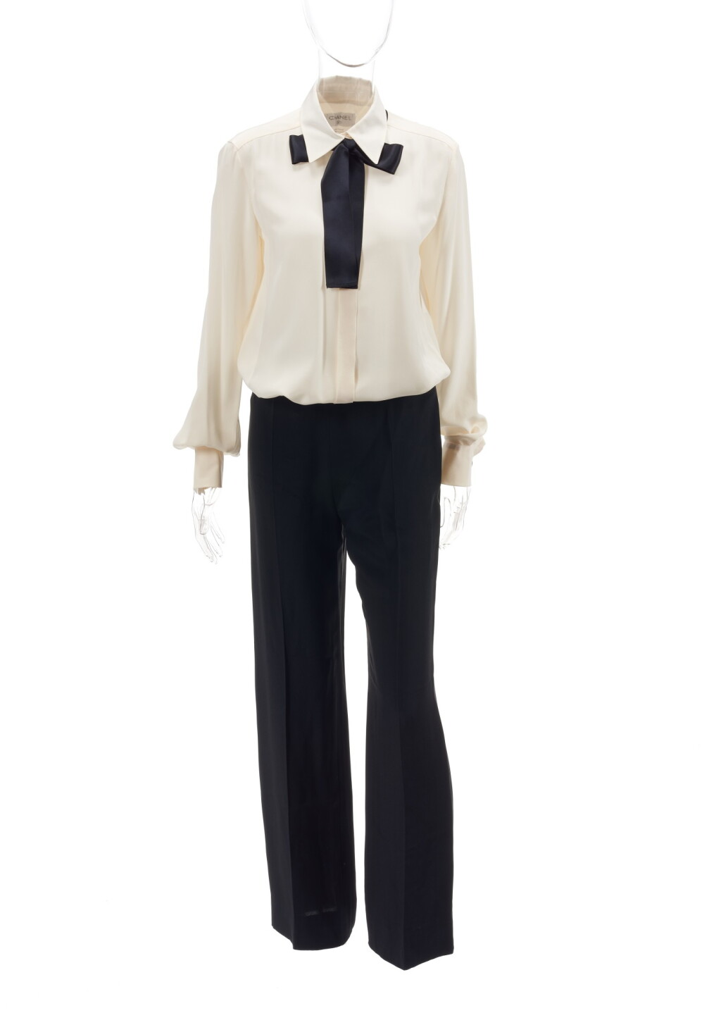 View full screen - View 1 of Lot 2. Pair of black silk trousers and two-tone silk blouse.