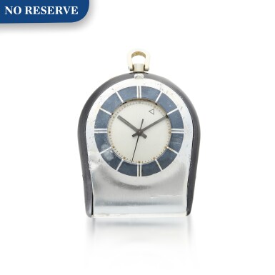 View full screen - View 1 of Lot 57. A STAINLESS STEEL, BLACK COATED STEEL AND GOLD PLATED TRAVEL CLOCK WITH ALARM, CIRCA 1970.