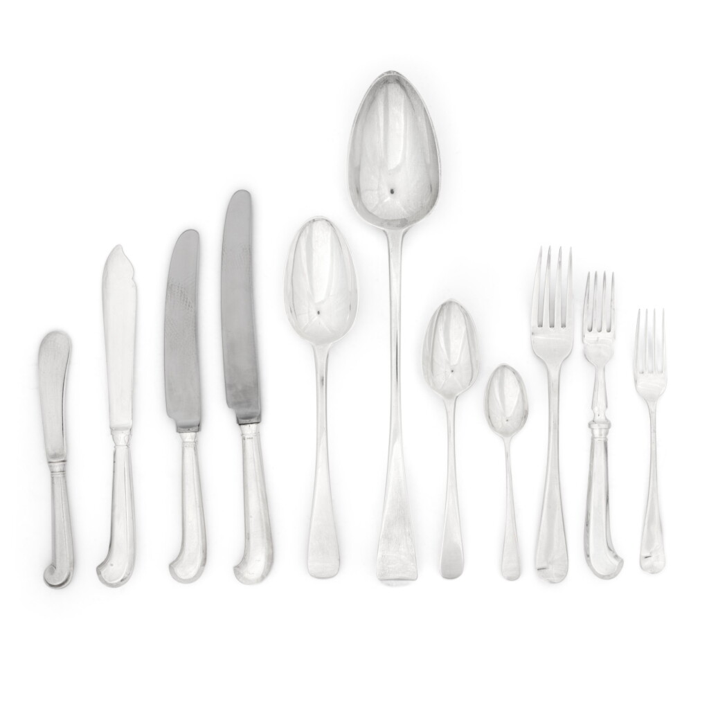 View full screen - View 1 of Lot 87. A George III and later silver flatware service in Old English pattern, the George III pieces mostly Soloman Hougham, London, 1800-1813; the later pieces Sheffield, 1988.