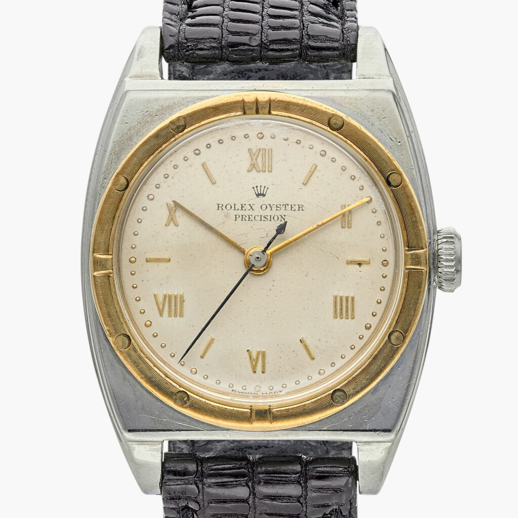View full screen - View 1 of Lot 557. Reference 3359 Oyster Precision | A stainless steel and yellow gold wristwatch, Circa 1946.