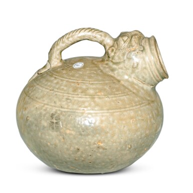 View full screen - View 1 of Lot 18. A 'Yue' celadon-glazed chimera-form vessel, Jin dynasty.