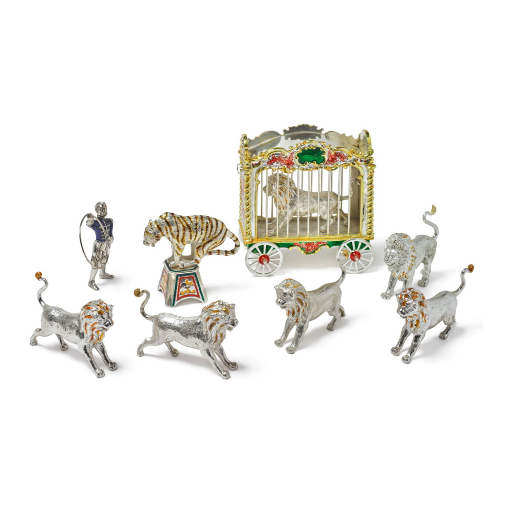 View full screen - View 1 of Lot 1856. LIONS: A GROUP OF SILVER AND ENAMEL CIRCUS FIGURES, DESIGNED BY GENE MOORE FOR TIFFANY & CO., NEW YORK, CIRCA 1990.