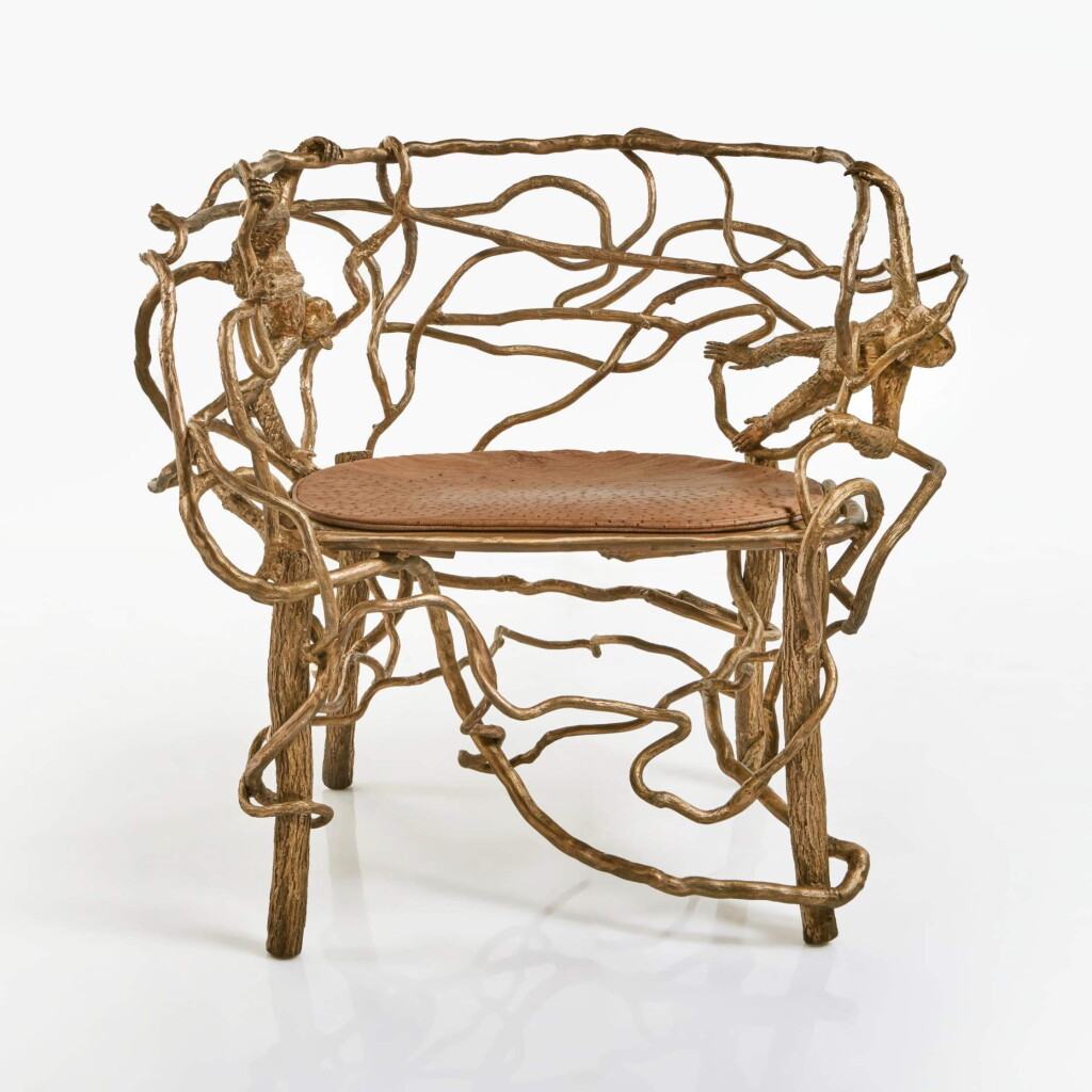 View full screen - View 1 of Lot 28. A Unique "Singerie" Armchair.