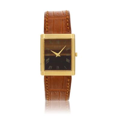 View full screen - View 1 of Lot 101. Reference 9151, A yellow gold rectangular wristwatch with tiger's eye, Circa 1968.